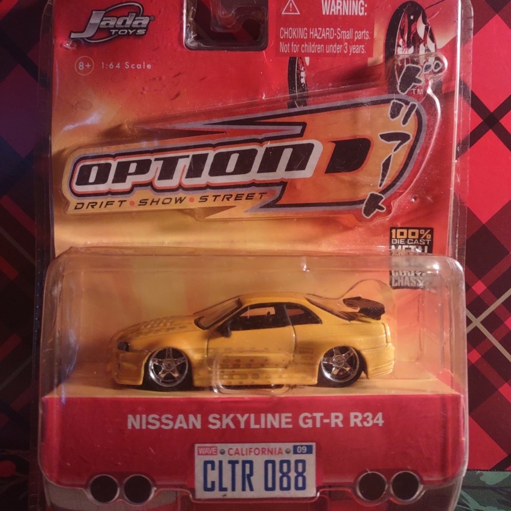 Jada Toys Import Racer Nissan Skyline GTR34 Yellow NIB JDM 1:64